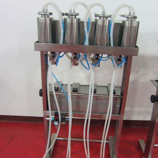 Semi Automatic 4-heads Vacuum Perfume Filler Liquid Filling Machine